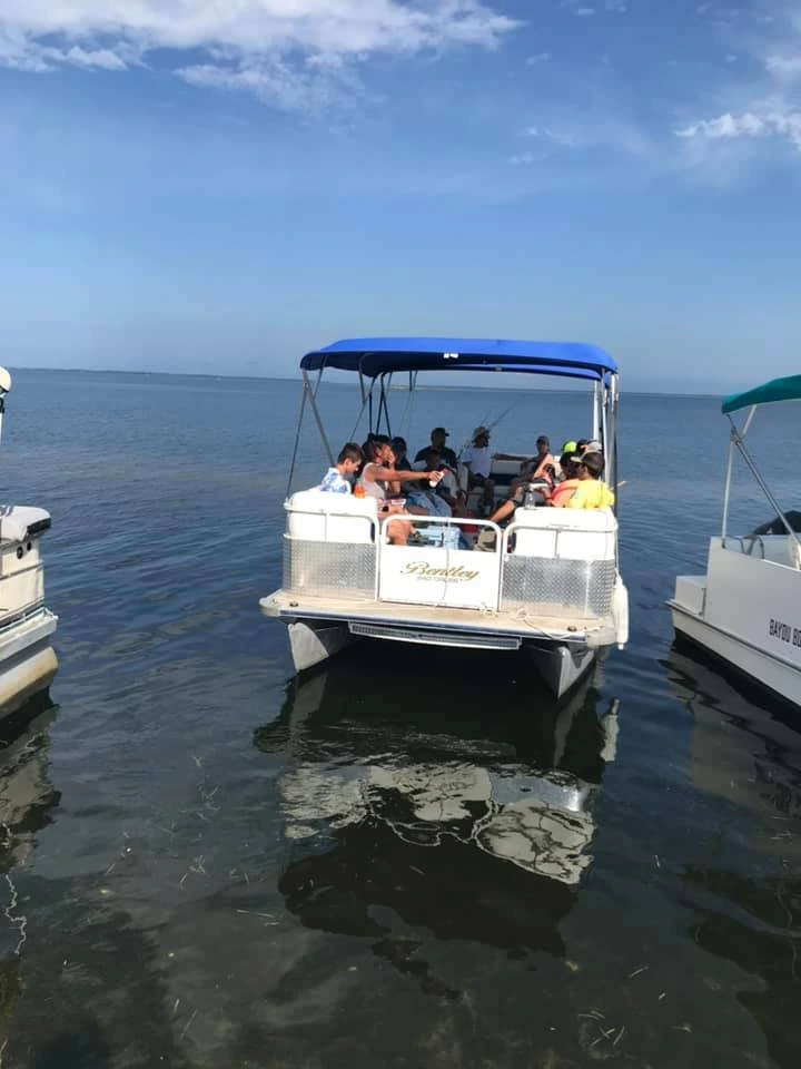 family returning rental boat to bayou boat rentals